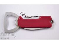 Corkscrew with opener and knife