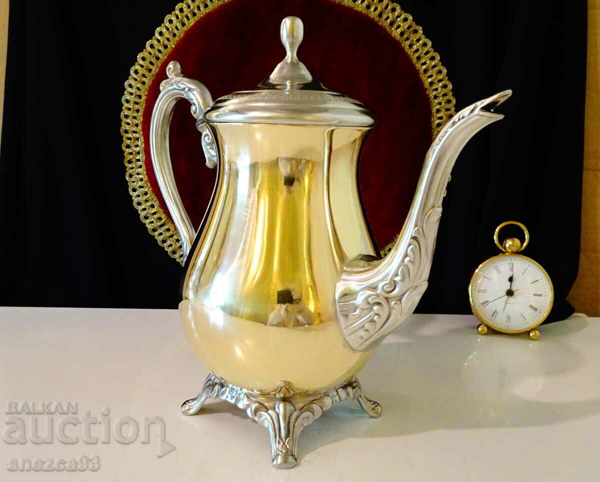 American designer teapot, bronze and pewter. with price 260.00 BGN | € 132.94 American designer teapot, bronze and pewter. with price 260.00 BGN | € 132.94