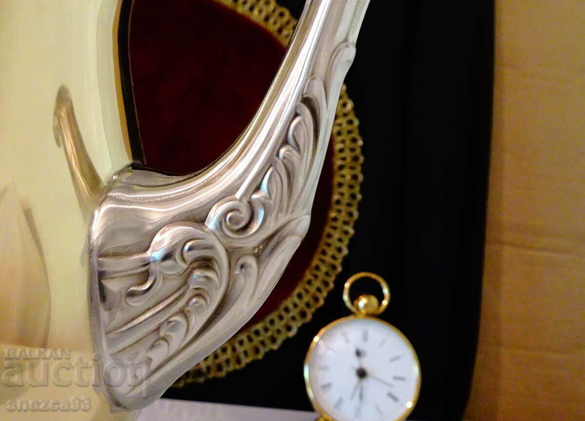 Delivery of American designer teapot, bronze and pewter. Delivery of American designer teapot, bronze and pewter.