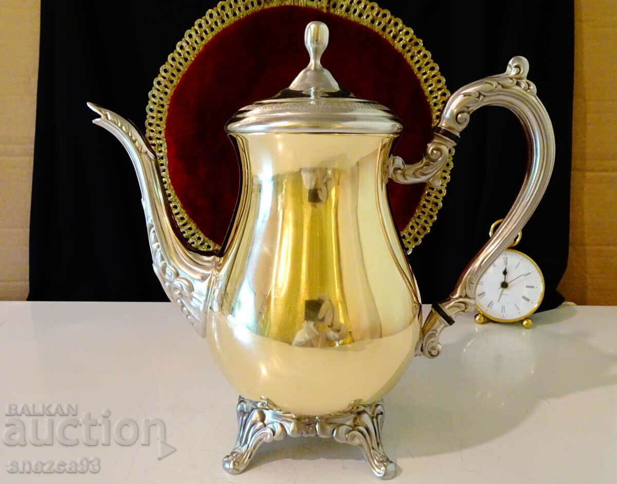 American designer teapot, bronze and pewter. American designer teapot, bronze and pewter.