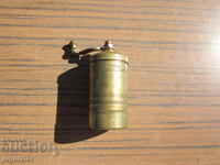 old small bronze mechanical pepper mill