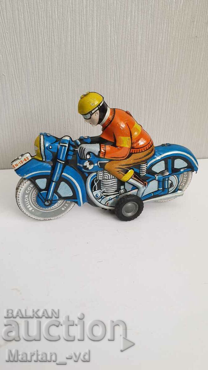 Delivery of OLD TIN TOY MOTORCYCLE Delivery of OLD TIN TOY MOTORCYCLE
