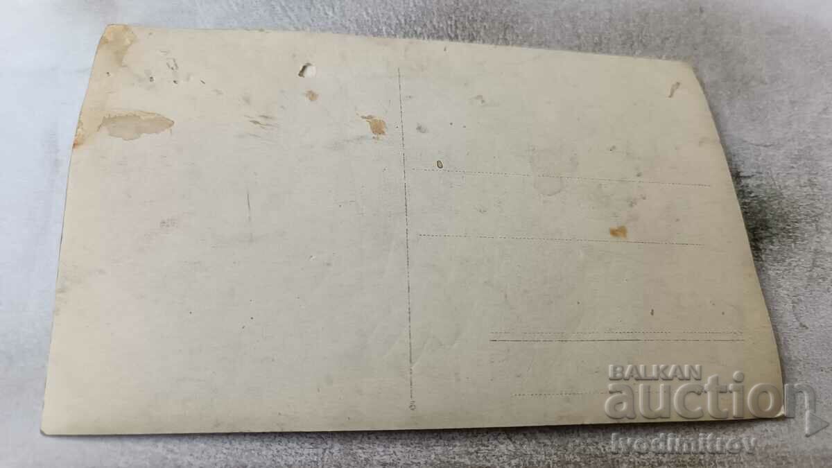 Photo Young people in front of one-story buildings with price 2.35 BGN | € 1.20 Photo Young people in front of one-story buildings with price 2.35 BGN | € 1.20