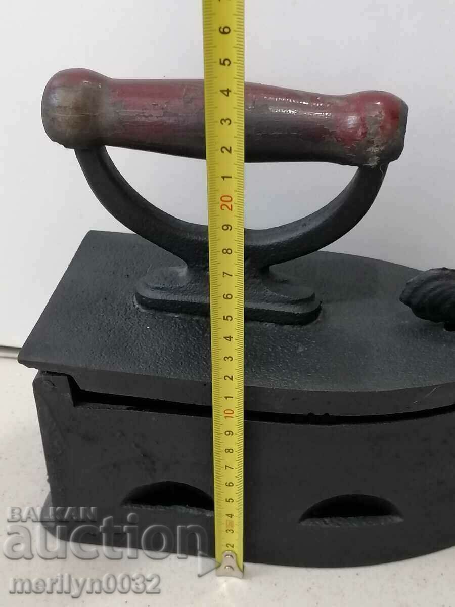 Auction  An old iron on fire