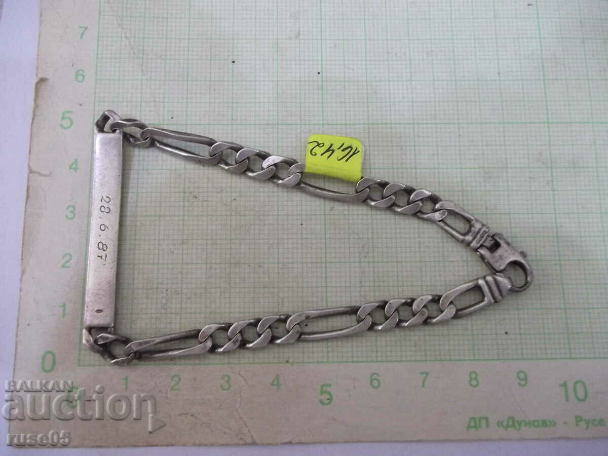 Auction Chain with a silver plate - 16.42 g. Auction Chain with a silver plate - 16.42 g.