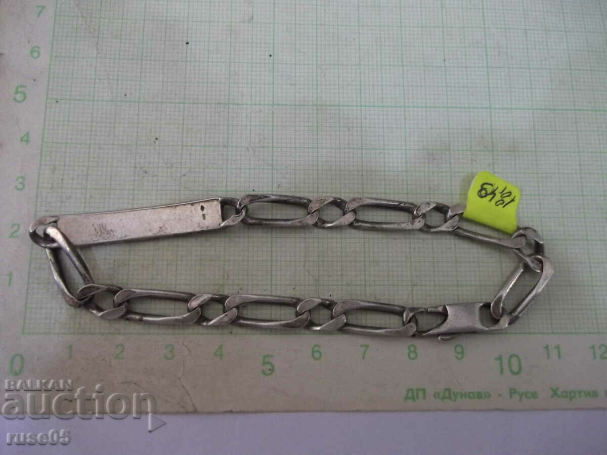 Auction Chain with a silver plate - 18.49 g. Auction Chain with a silver plate - 18.49 g.