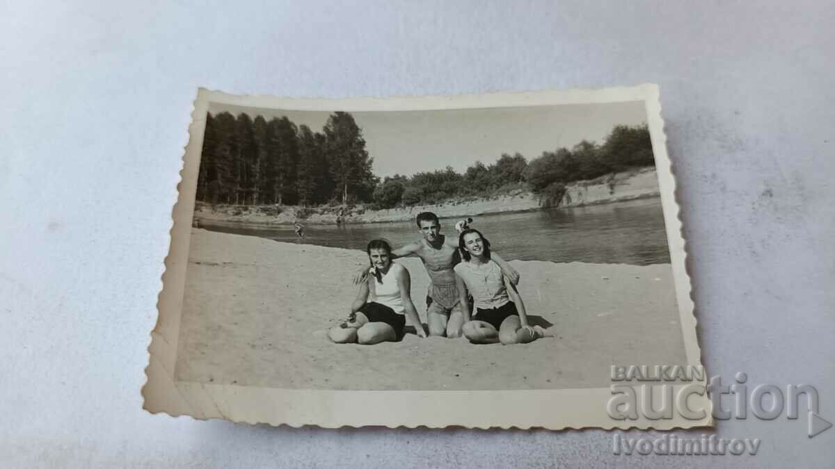 Ms. Gigen Mladej and two girls on the beach along the river Iskar