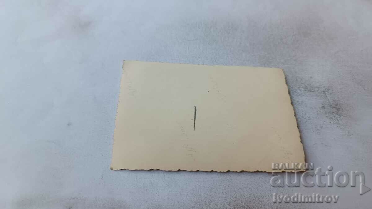 Photo Sofia Three men in winter coats on the sidewalk with price 2.65 BGN | € 1.35 Photo Sofia Three men in winter coats on the sidewalk with price 2.65 BGN | € 1.35