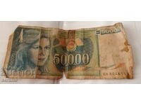 50,000 dinars