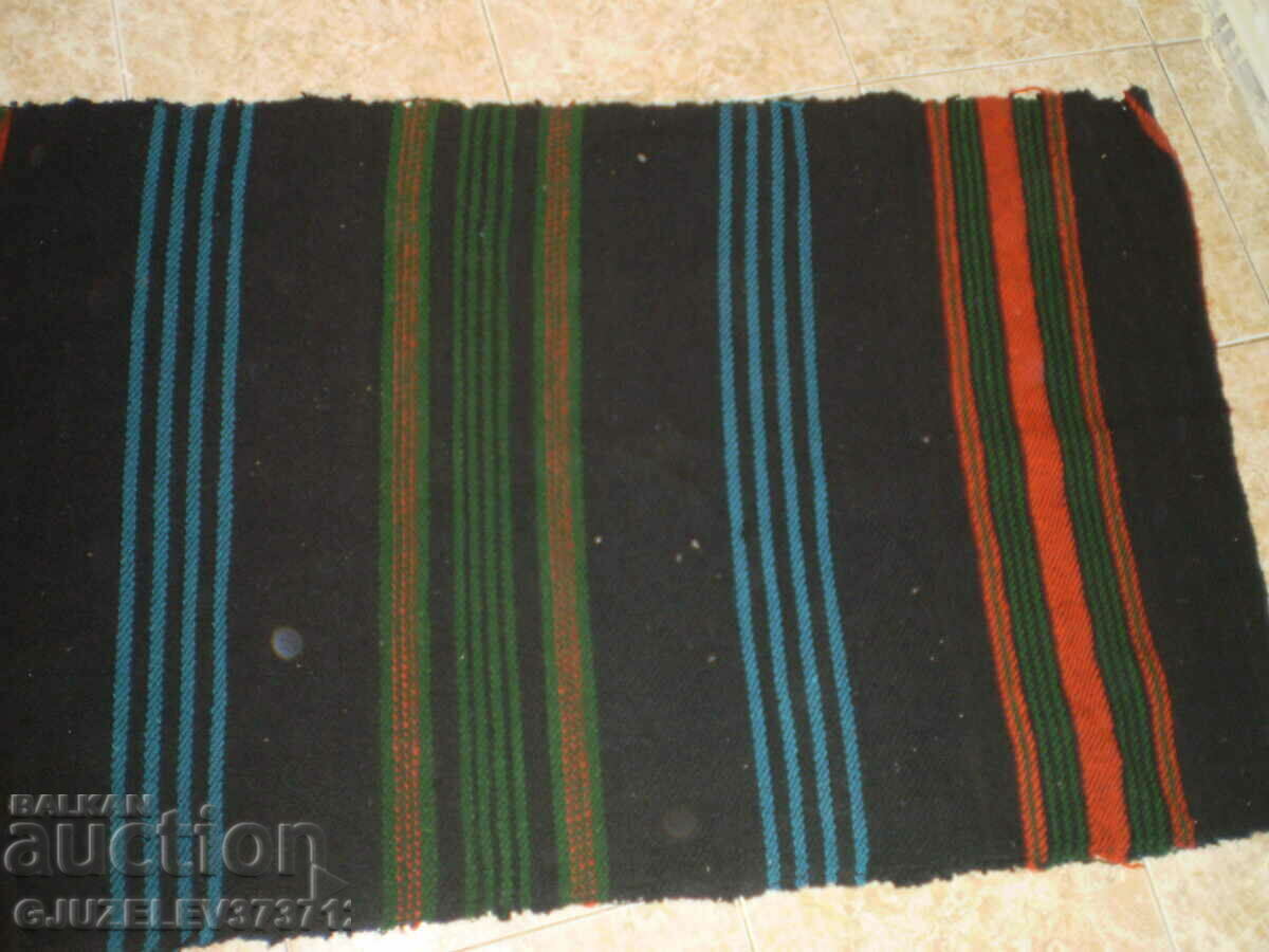 Delivery of Primitive handwoven woolen patterned rug