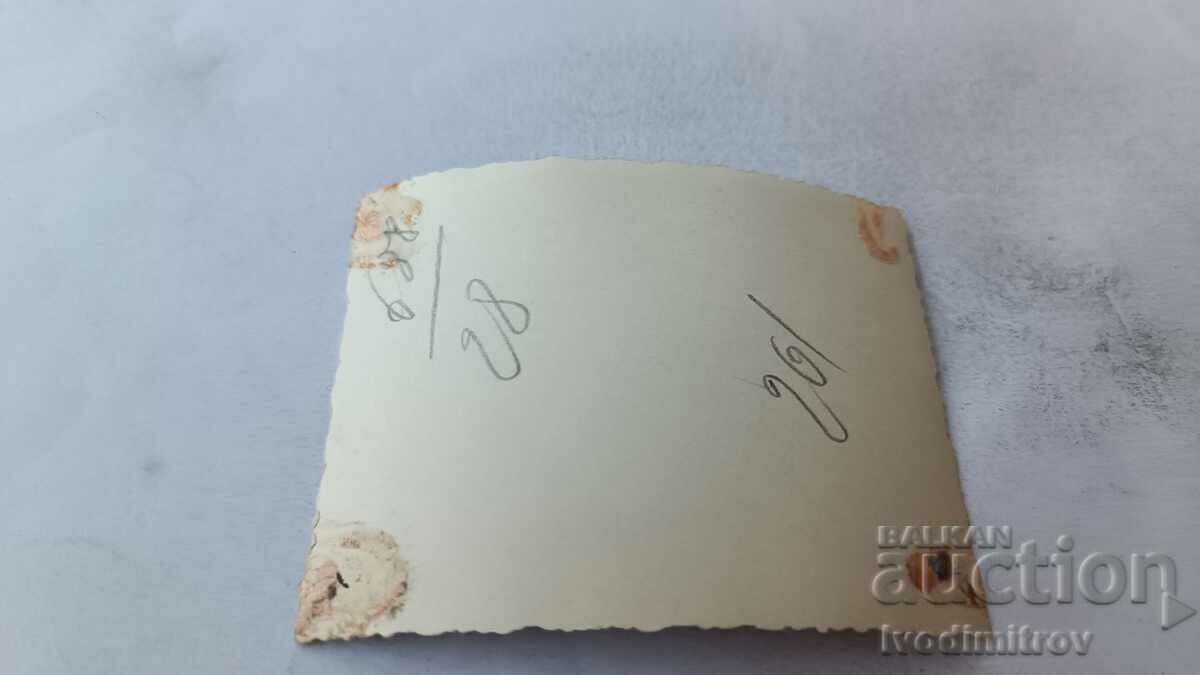 Photo Young men and women on the beach with price 1.45 BGN | € 0.74