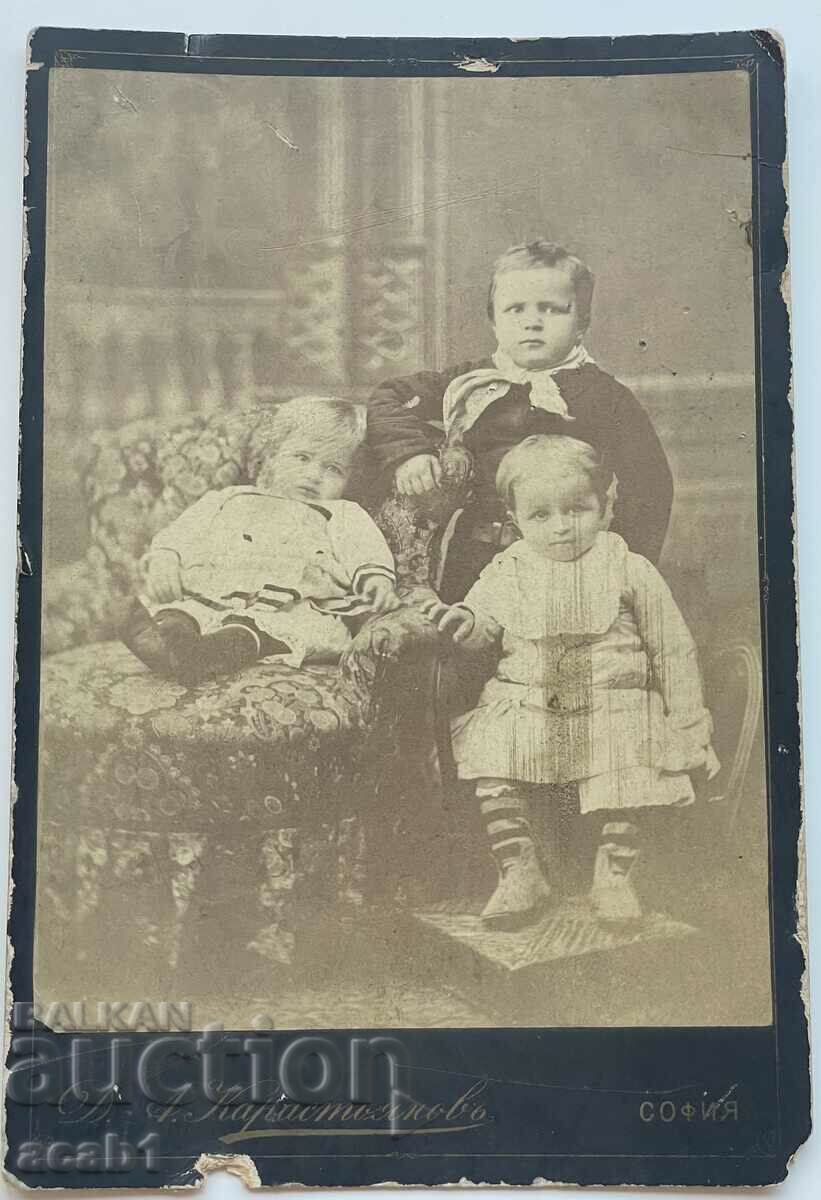 Studio photo of three Karastoyanov children