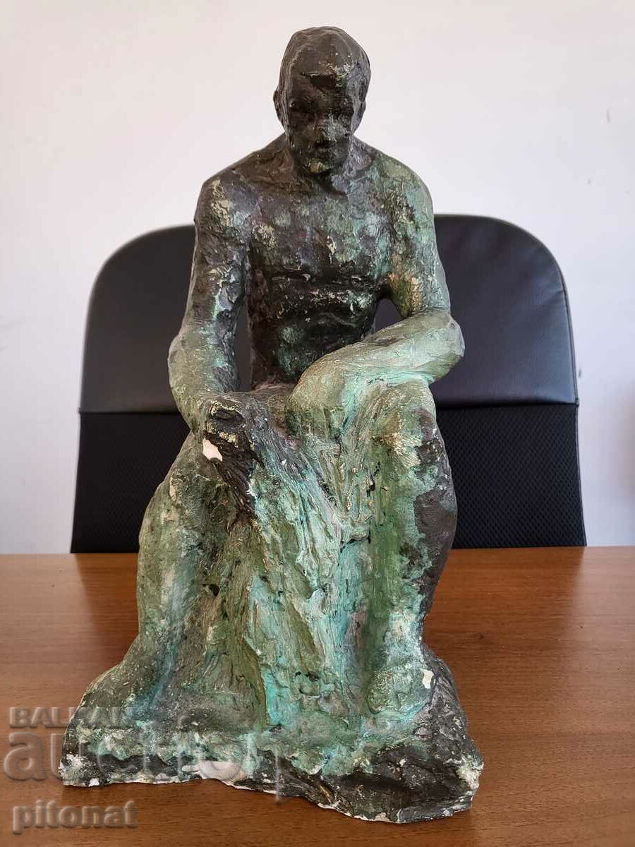 Old author statuette plastic