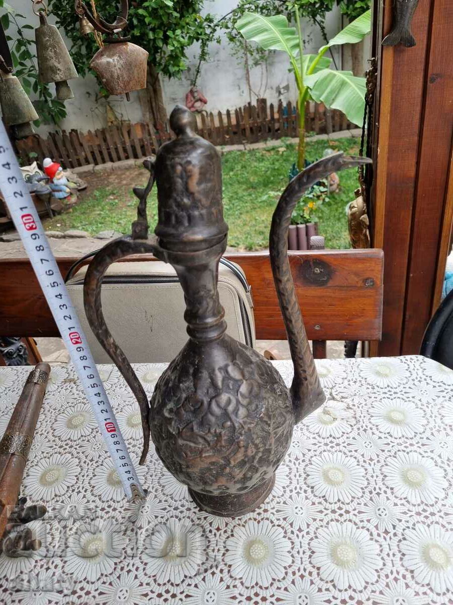 Old copper jug.