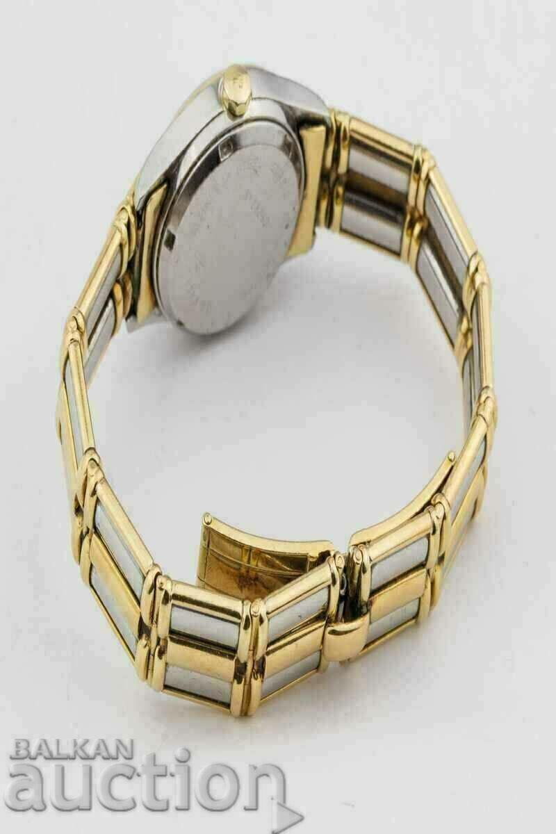 GIRARD PERREGAUX QUARTZ 18k gold жълто и бяло злато гривна с цена € 6199.00 | 12124.19 лв. GIRARD PERREGAUX QUARTZ 18k gold жълто и бяло злато гривна с цена € 6199.00 | 12124.19 лв.