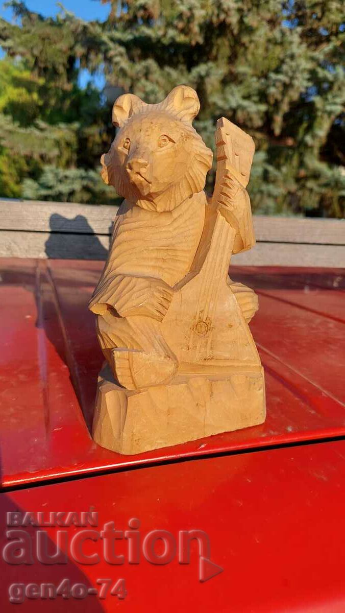 Russian carved bear with guitar