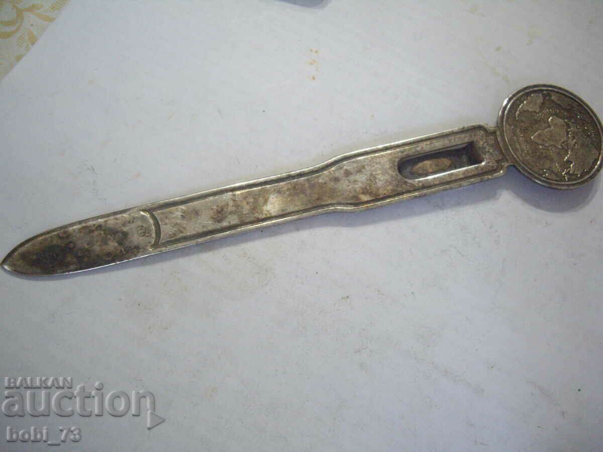 Delivery of Old silver letter knife. Delivery of Old silver letter knife.
