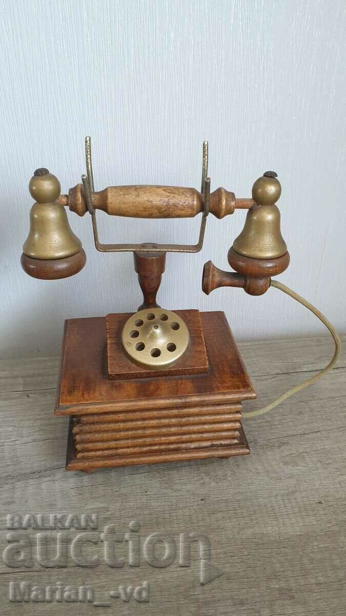 Old wooden jewelry box in the shape of a phone