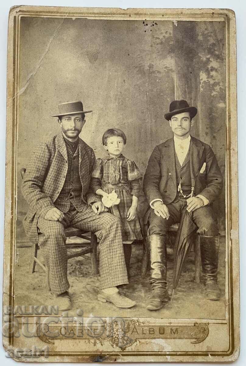 Photograph of Two Gentlemen and a Child
