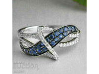 Women's ring with sapphires and topazes