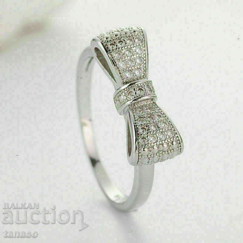 Women's ring with white zircons - ribbon with price 25.00 BGN | € 12.78 Women's ring with white zircons - ribbon with price 25.00 BGN | € 12.78