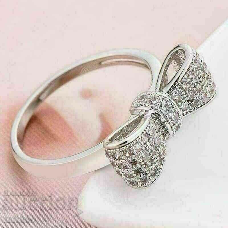 Delivery of Women's ring with white zircons - ribbon Delivery of Women's ring with white zircons - ribbon