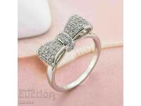 Γυναικείο δαχτυλίδι με λευκά ζιργκόν - κορδέλα