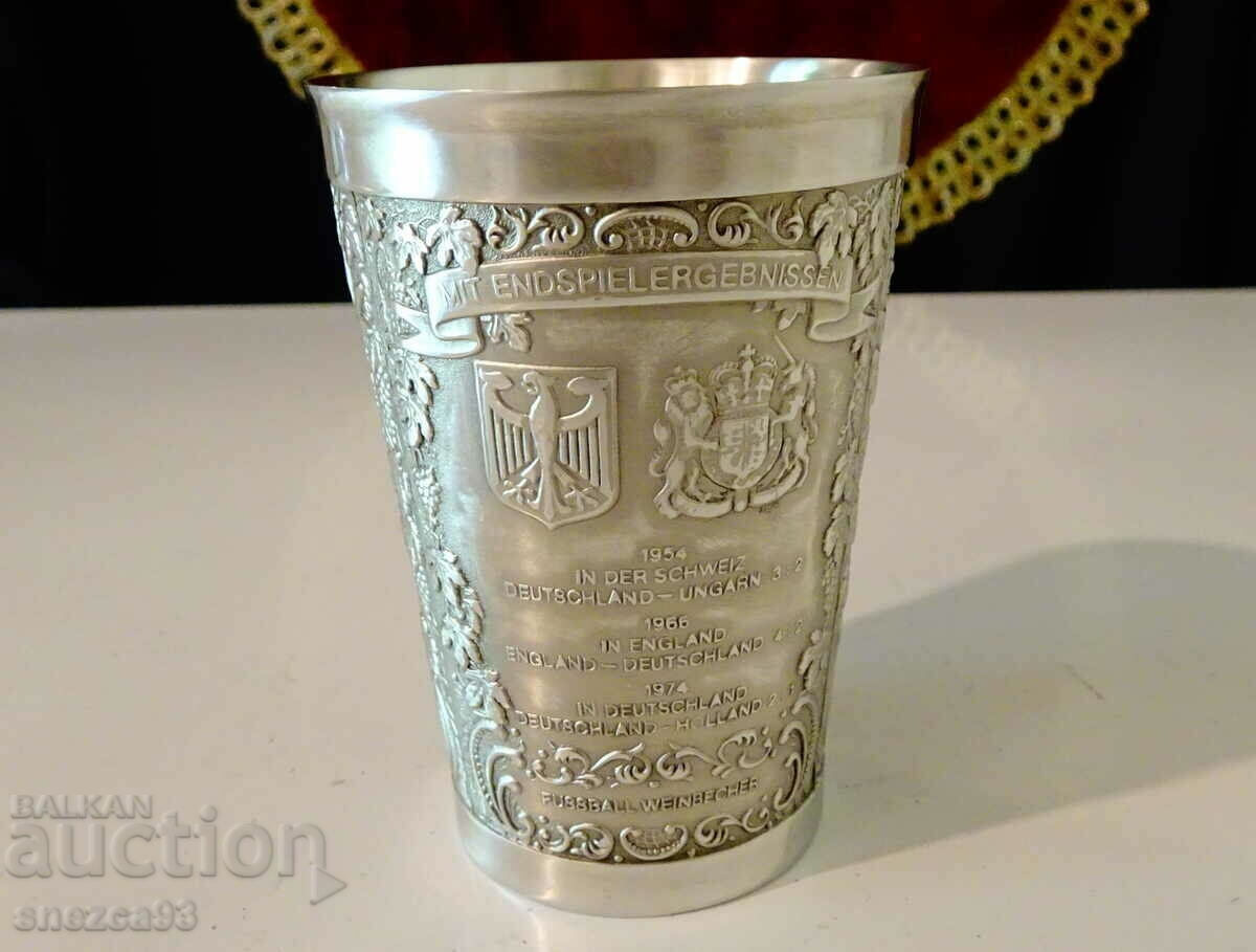Auction  Pewter wine glass with German coats of arms