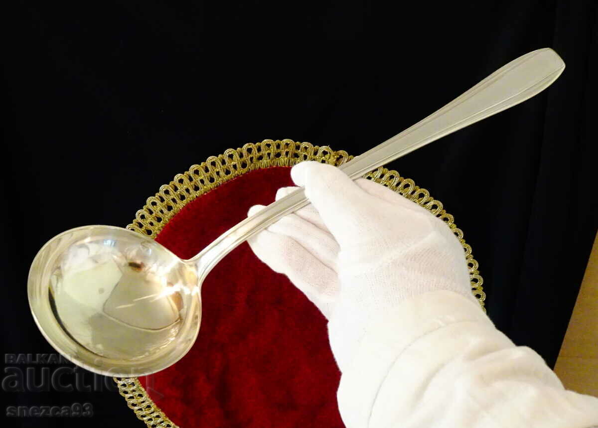 Solid Italian silver plated ladle.