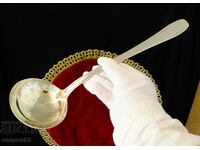 Solid Italian silver plated ladle.