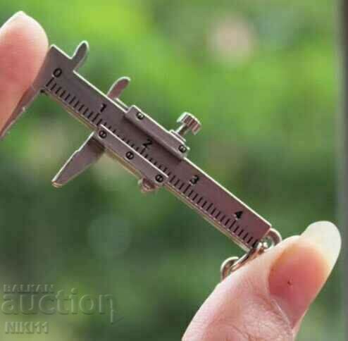 Metal keyring caliper with price 7.00 BGN | € 3.58 Metal keyring caliper with price 7.00 BGN | € 3.58