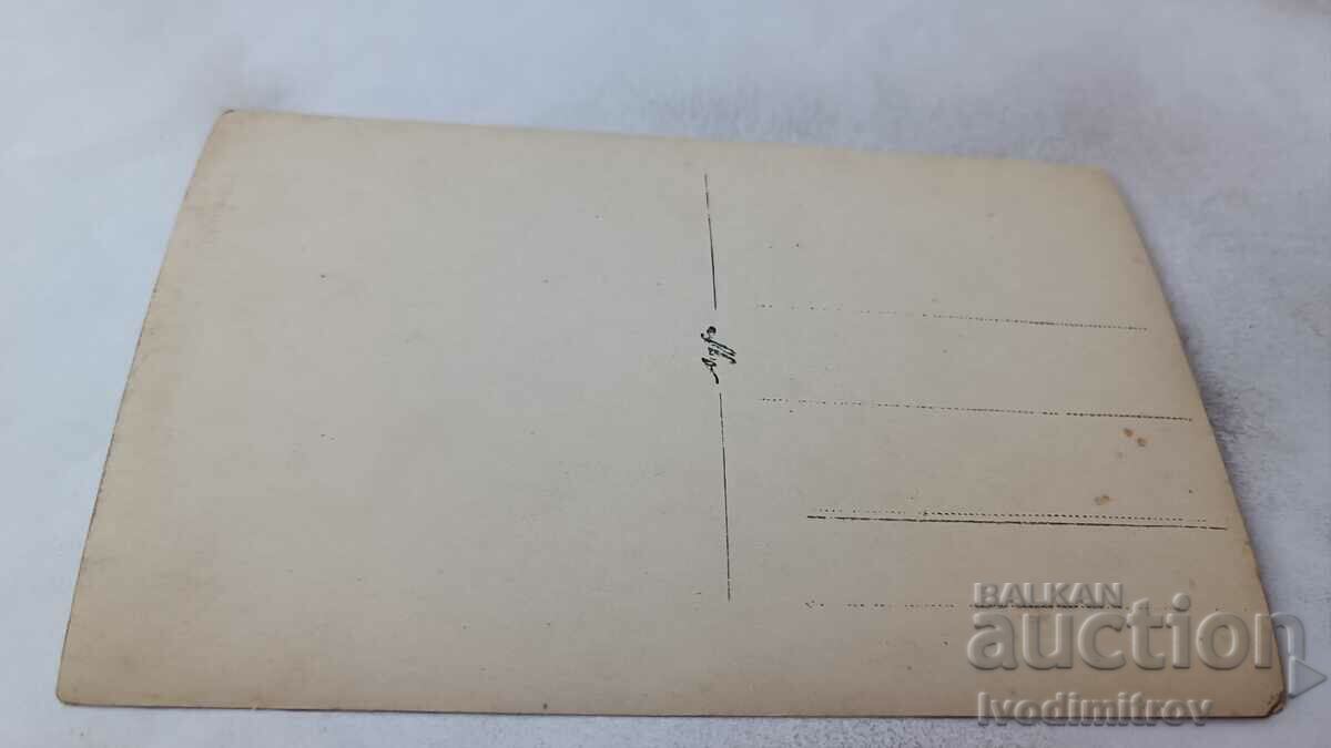 Photo Young men on a wooden bench with price 2.45 BGN | € 1.25 Photo Young men on a wooden bench with price 2.45 BGN | € 1.25