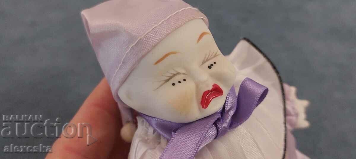 Auction  An old porcelain doll