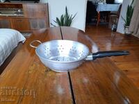 Old aluminum strainer, colander