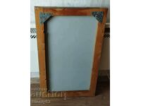 Second-hand mirror in a wooden frame 75/45 cm