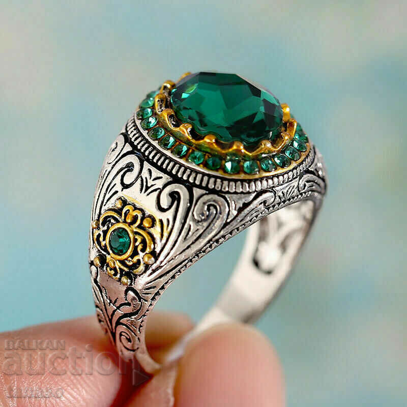 Men's ring with emerald and zircons