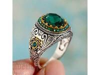 Men's ring with emerald and zircons