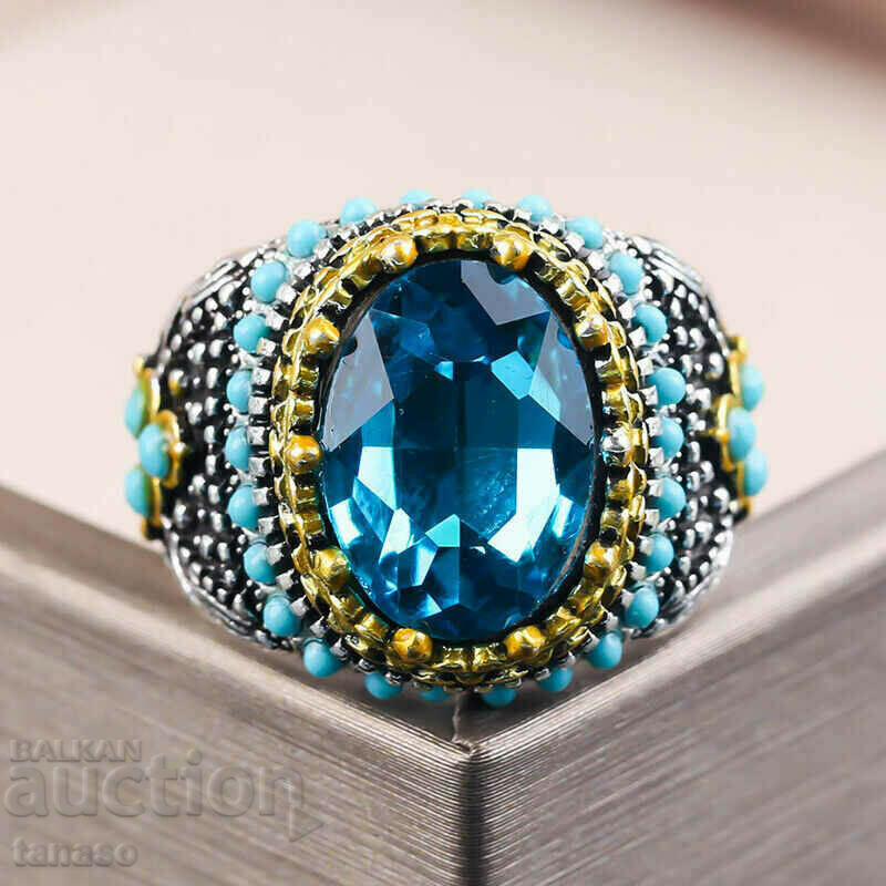 Auction  Men's ring with blue zircon and turquoises
