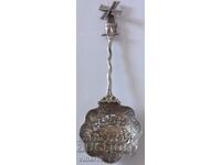 Silver spoon-blades of the mill spin