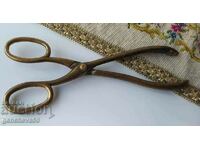 A rare Victorian brass scissor clip