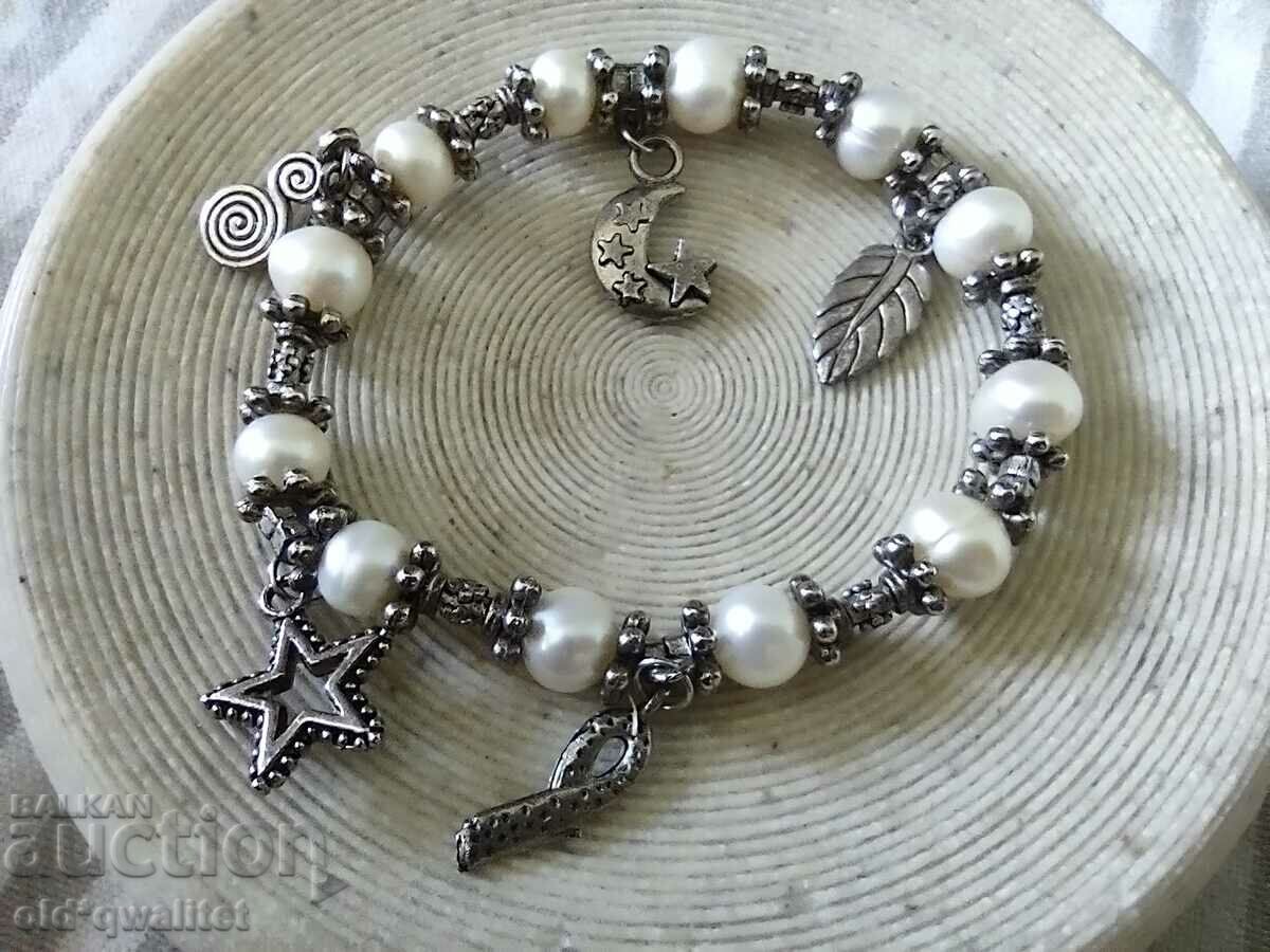 Attractive spectacular BRACELET, natural pearls and pendants with price 97.00 BGN | € 49.60 Attractive spectacular BRACELET, natural pearls and pendants with price 97.00 BGN | € 49.60