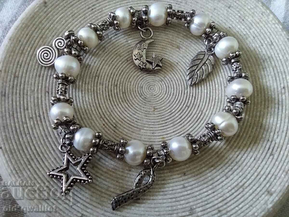 Attractive spectacular BRACELET, natural pearls and pendants Attractive spectacular BRACELET, natural pearls and pendants