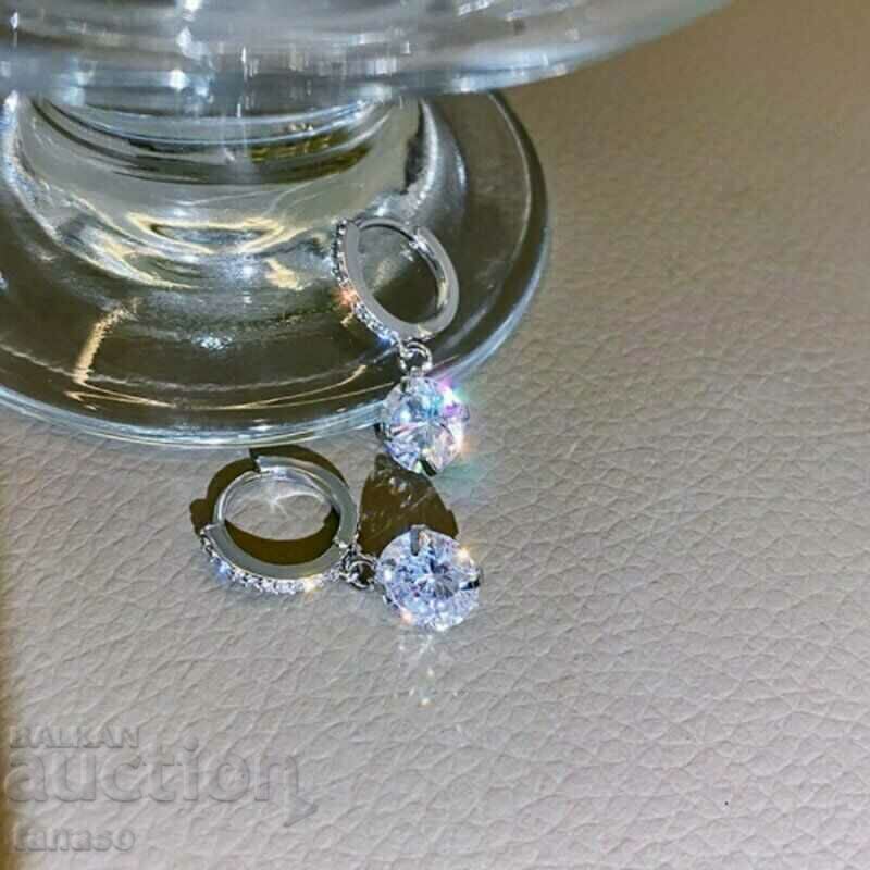 Auction  Earrings with round zircons - hanging