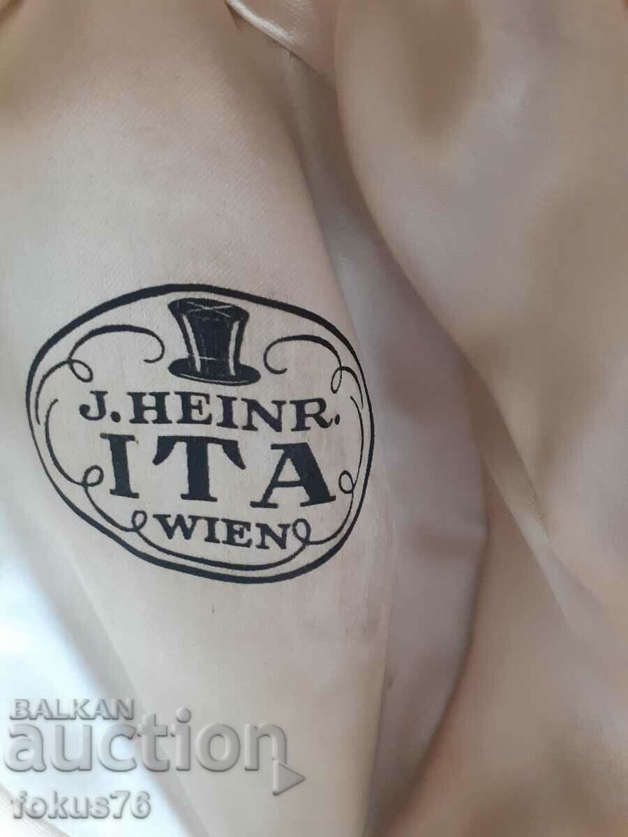 Delivery of Old branded Viennese bombe hat Delivery of Old branded Viennese bombe hat