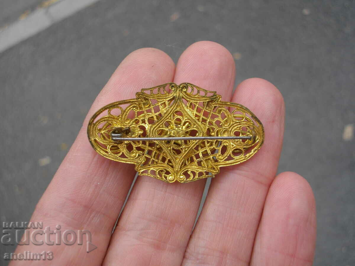 Delivery of OLD BROOCH