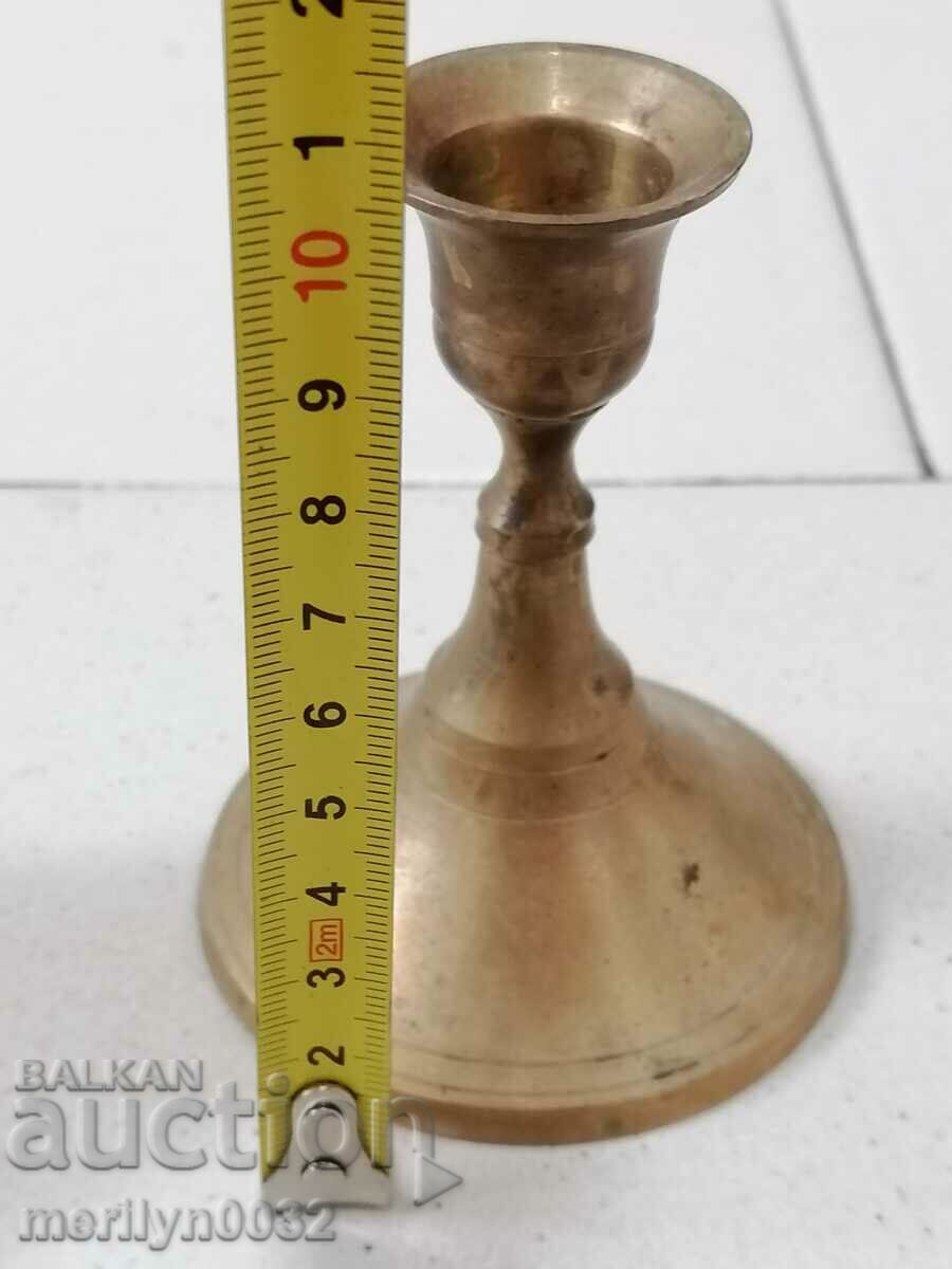 Delivery of Old bronze candlestick, candle Delivery of Old bronze candlestick, candle