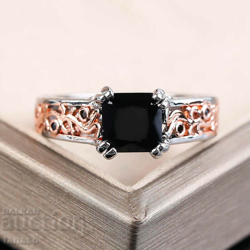 Ring with black zircon