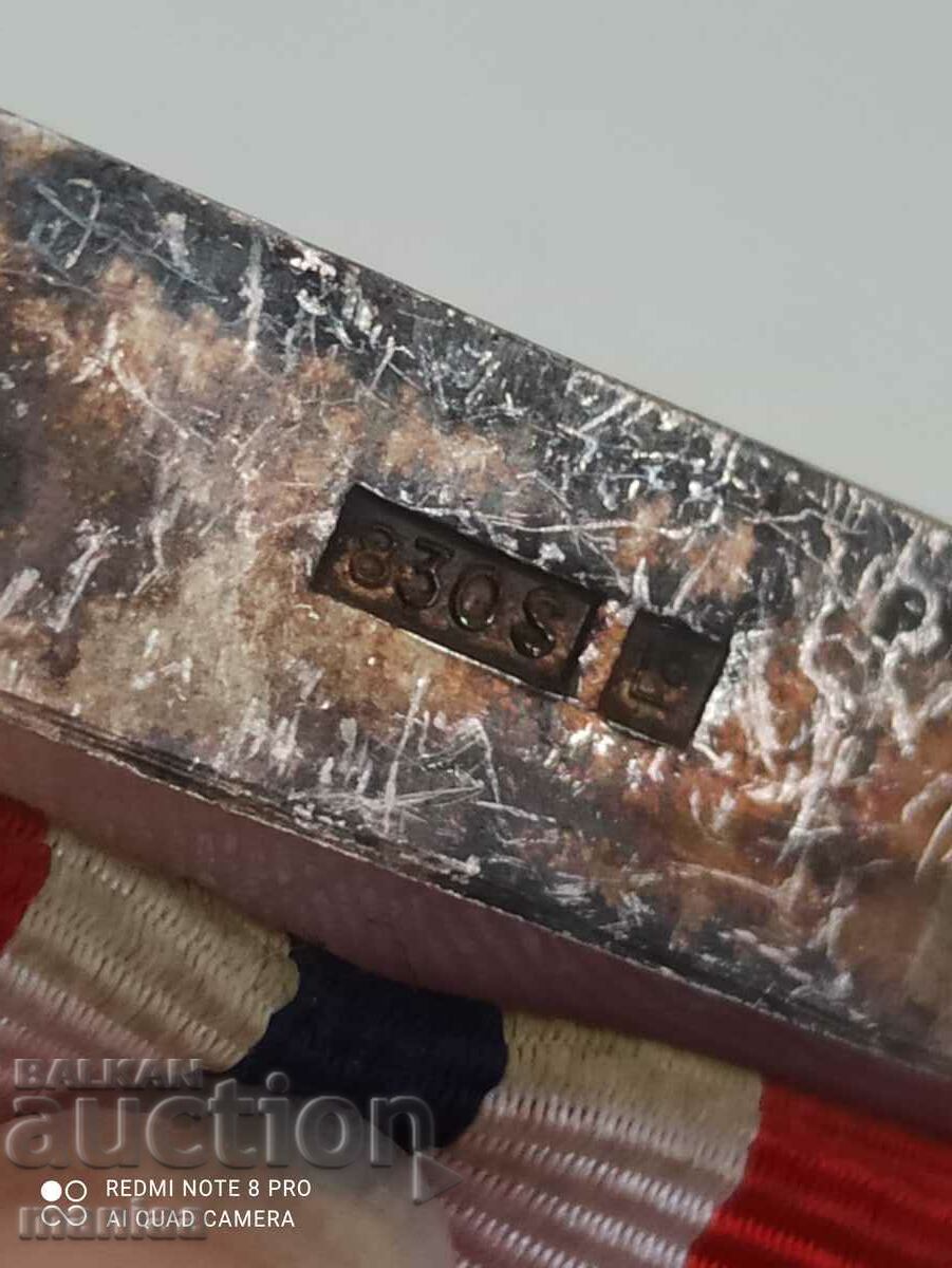 Delivery of Norwegian Silver Medal with mark