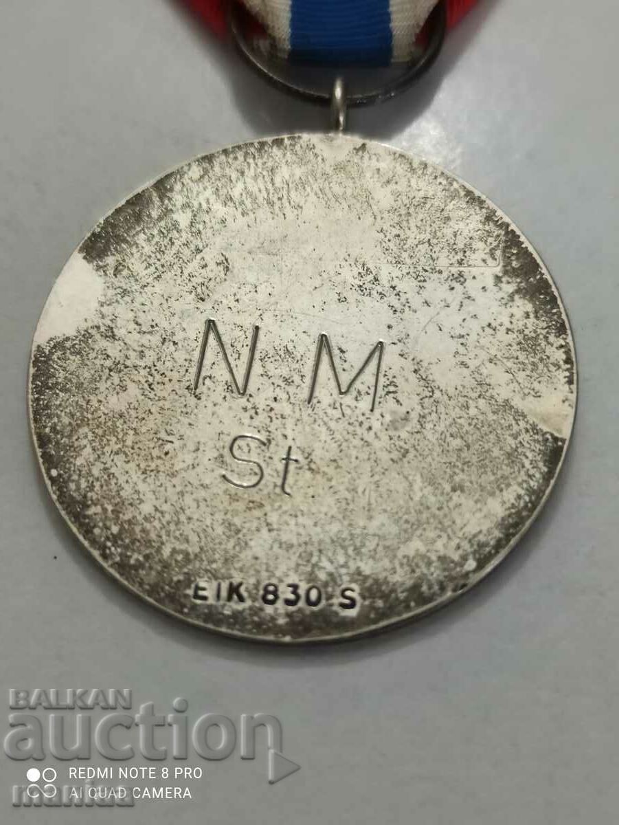 Delivery of Norwegian Silver Medal with mark Delivery of Norwegian Silver Medal with mark