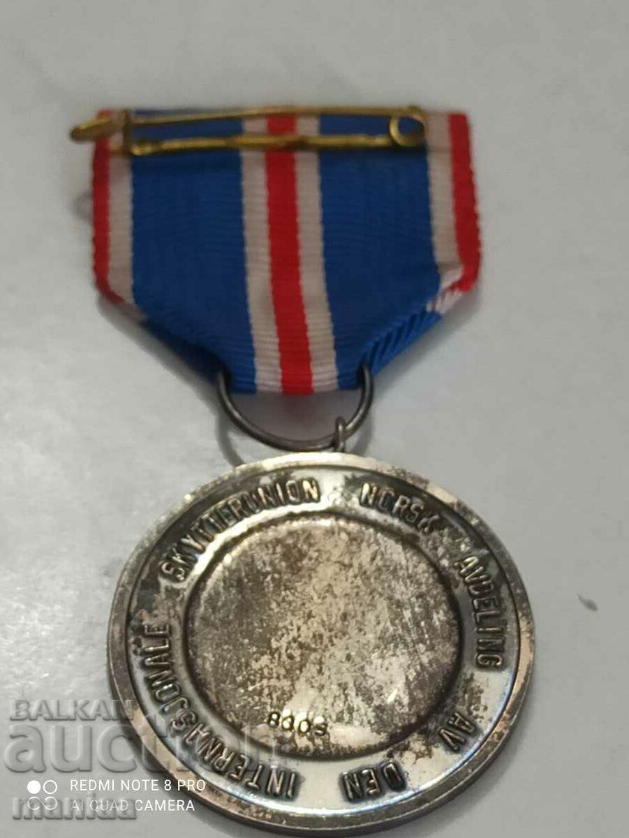 Delivery of Norwegian Silver Medal with mark